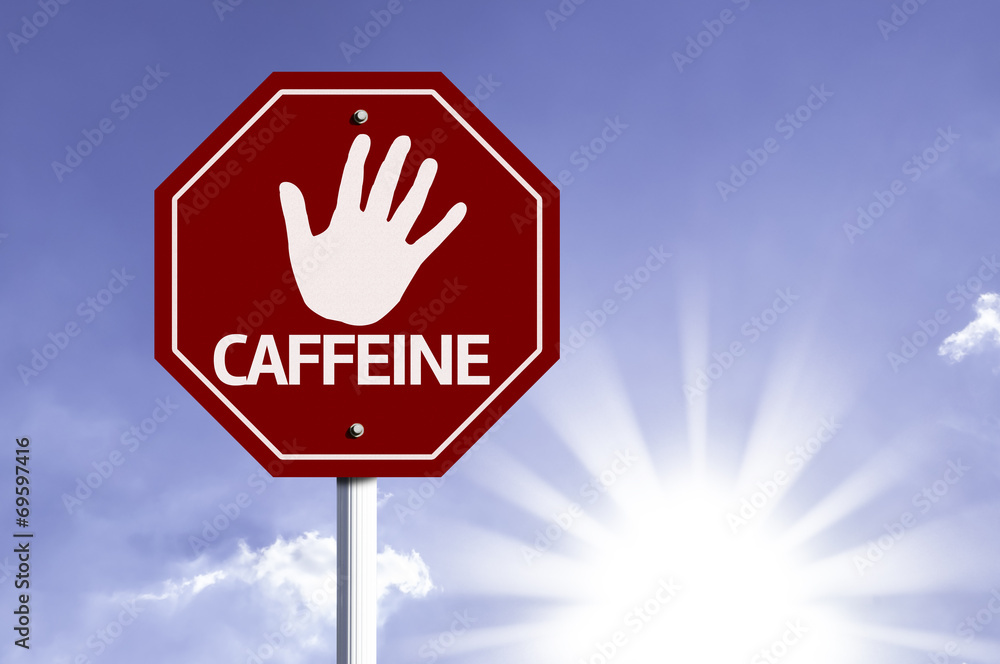 Stop Caffeine red sign with sun background Stop Caffeine red sign with sun background
