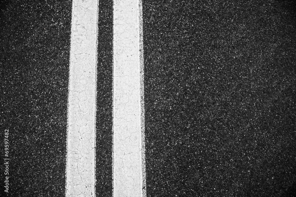 Fototapeta premium white double lines asphalt road background