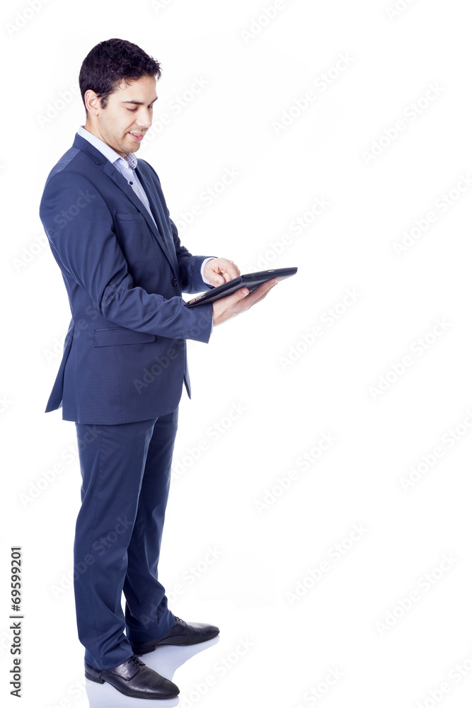 Handsome business with a tablet pc, isolated on white Handsome business with a tablet pc, isolated on white