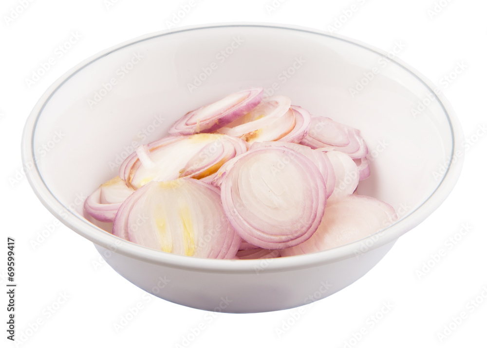 Chopped onions in a bowl over white background Chopped onions in a bowl over white background