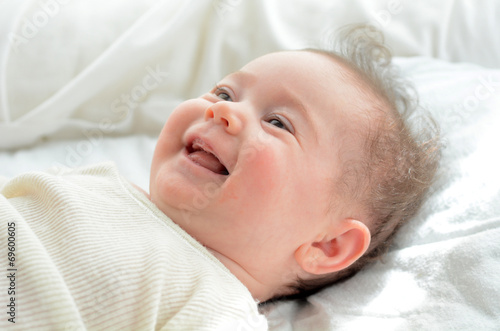 Face of a newborn baby smile