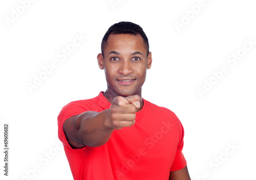 Latin American casual man pointing at the camera with finger