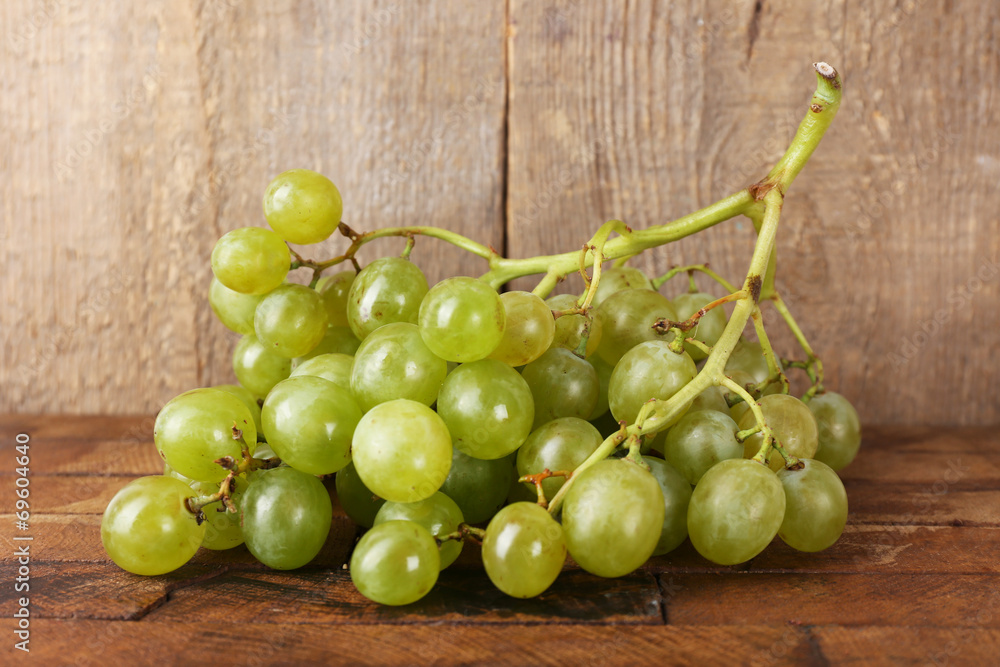 Green grape on wooden background Green grape on wooden background