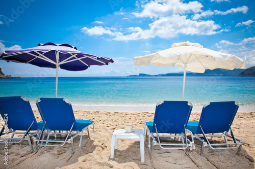 Deckchair on beautiful Lichnos beach near Parga  Greece.