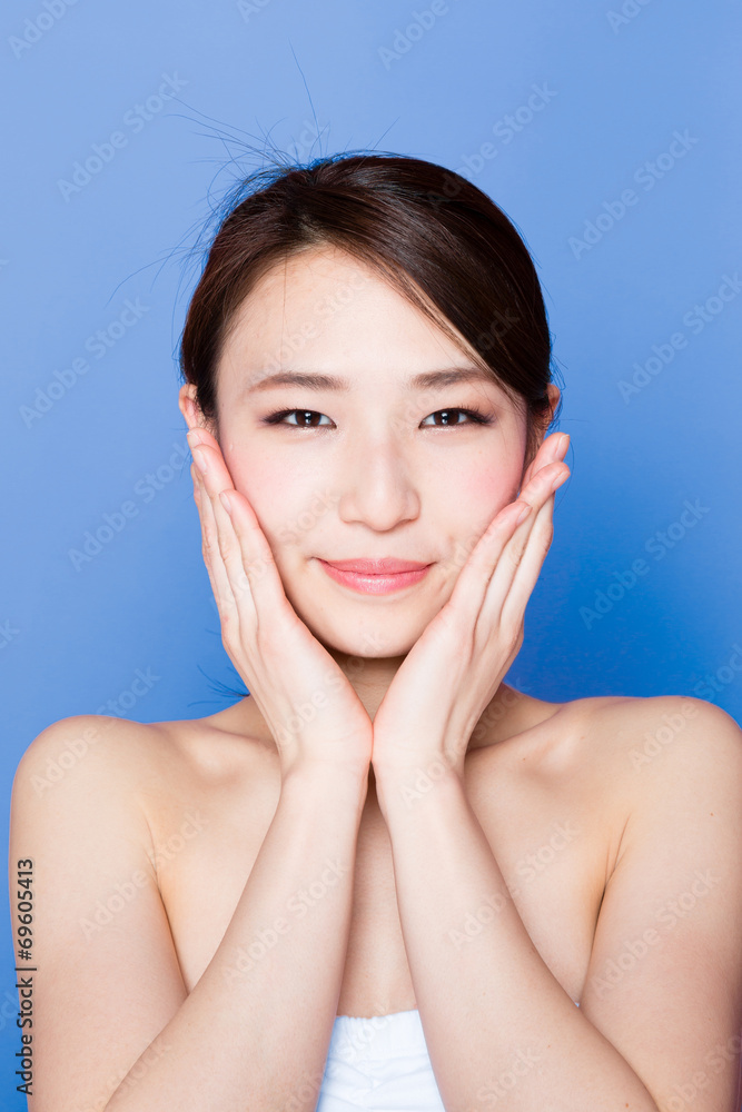 beautiful asian woman on blue background beautiful asian woman on blue background