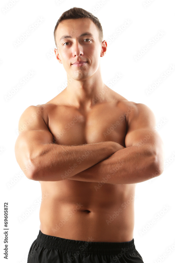 Fototapeta premium Handsome muscle young man isolated on white