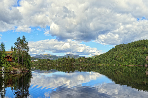 Fototapeta Naklejka Na Ścianę i Meble -  Idyllic view of lake with mountains of Norway.