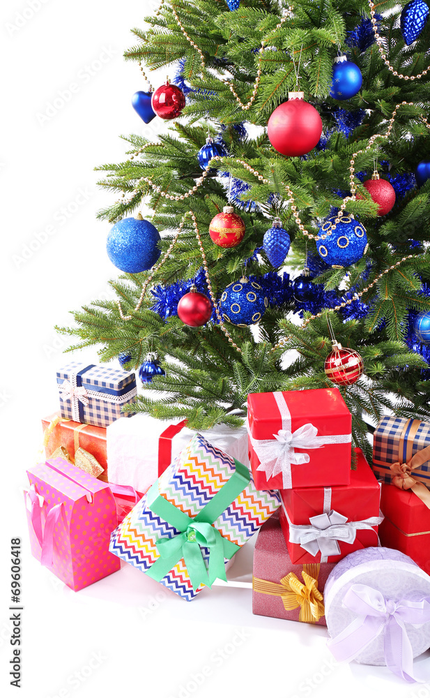 Christmas tree and presents isolated on white