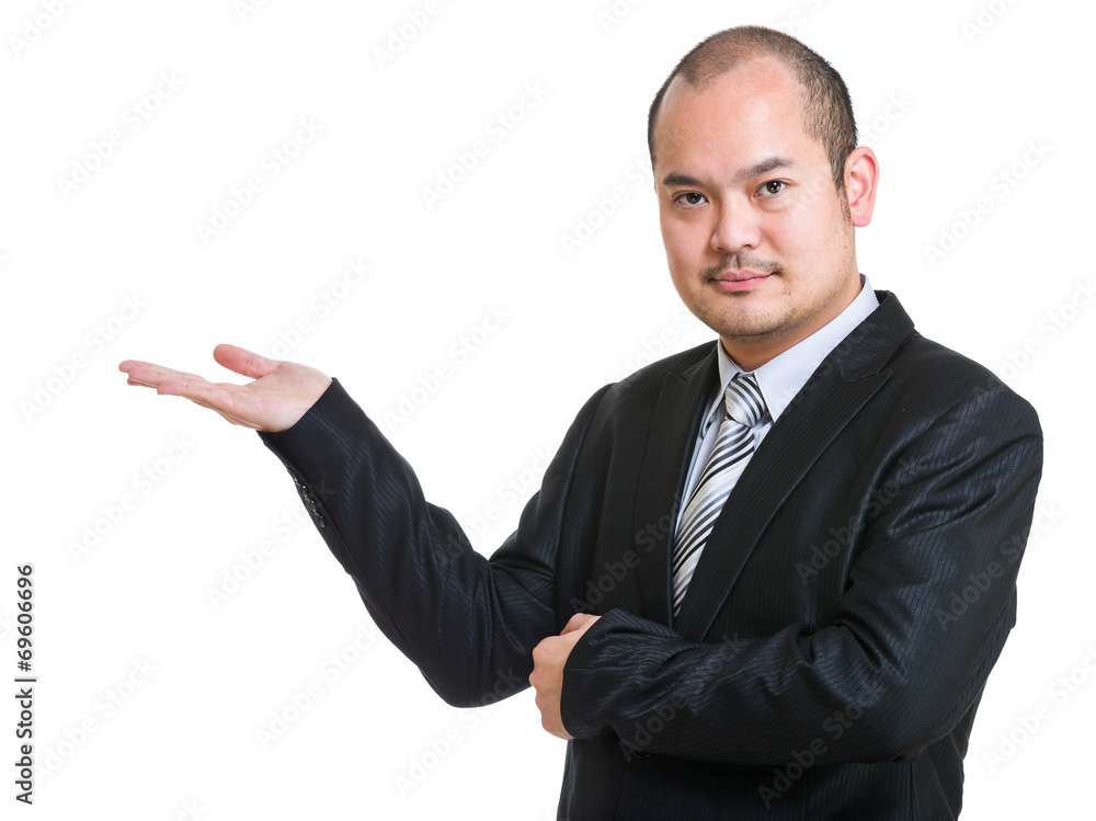 Businessman with hand presentation Businessman with hand presentation