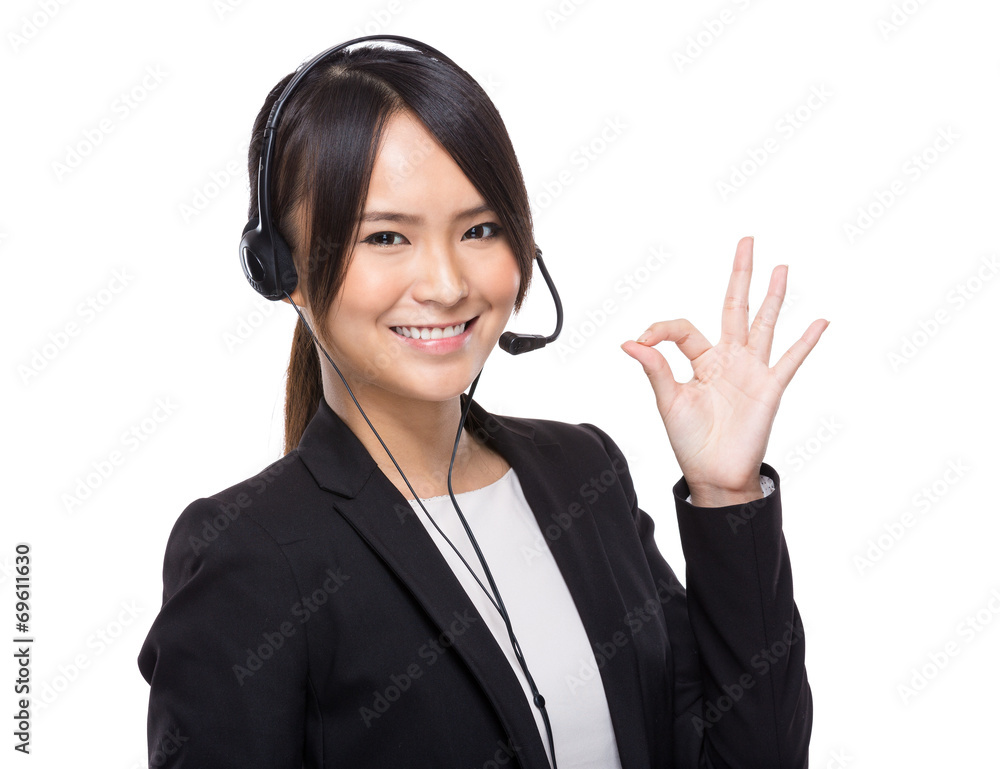 Asian female customer services with ok sign Asian female customer services with ok sign