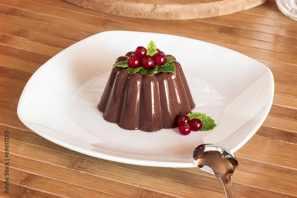 Chocolate pudding with red berries Chocolate pudding with red berries