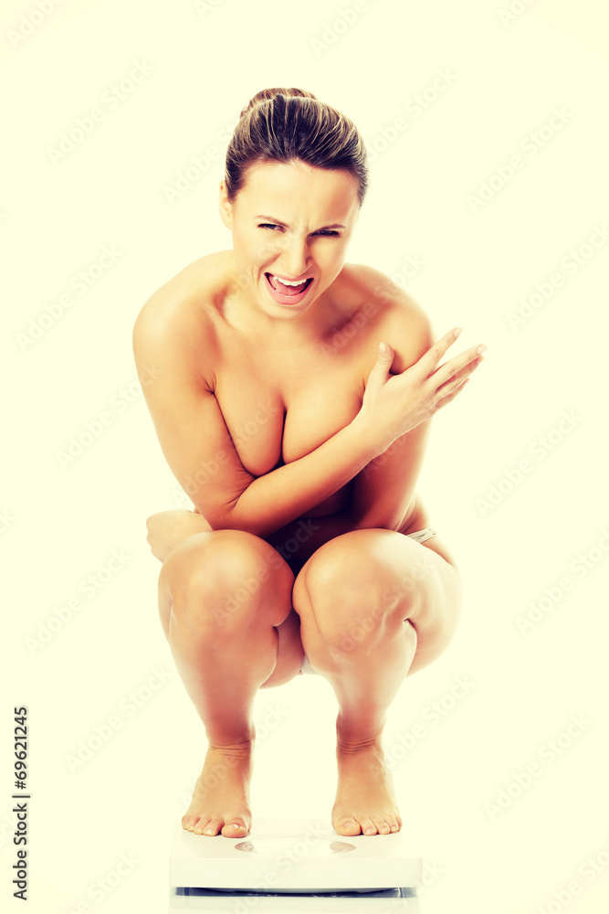 Fototapeta premium Naked woman on a scope.