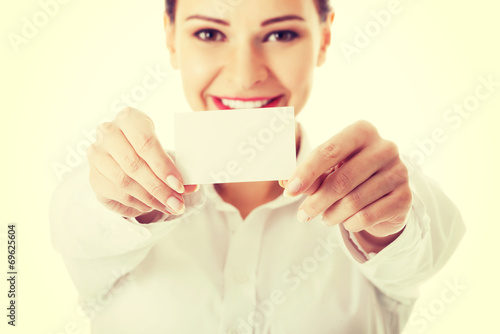 Beautiful business woman holding personal card.