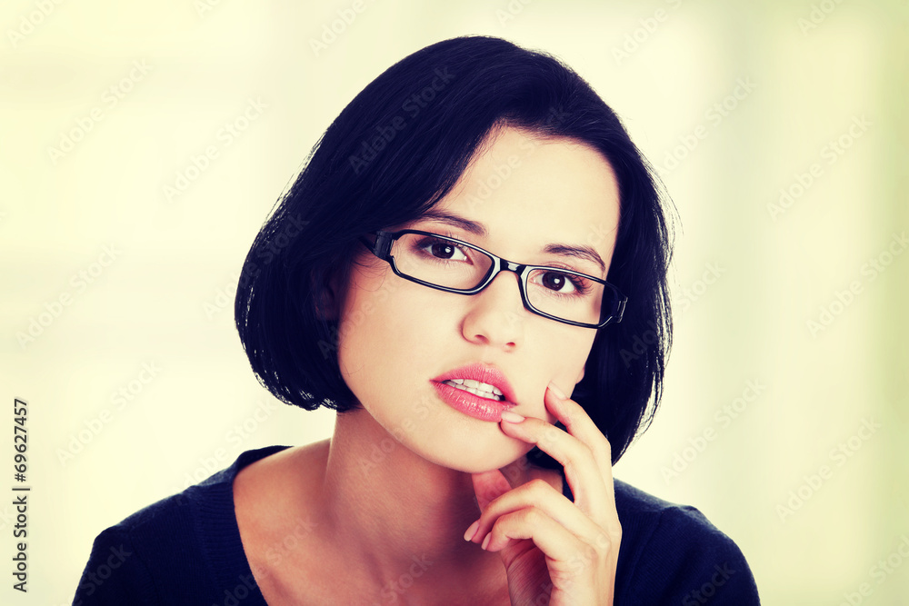 Young beautiful woman in casual clothes thinking Young beautiful woman in casual clothes thinking