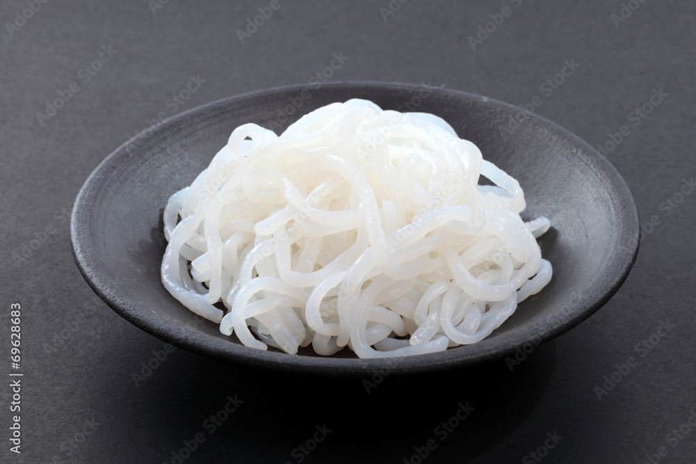 Udon noodles on black dish, Japanese food