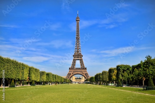 Eiffel Tower, iconic Paris landmark with vibrant blue sky photo