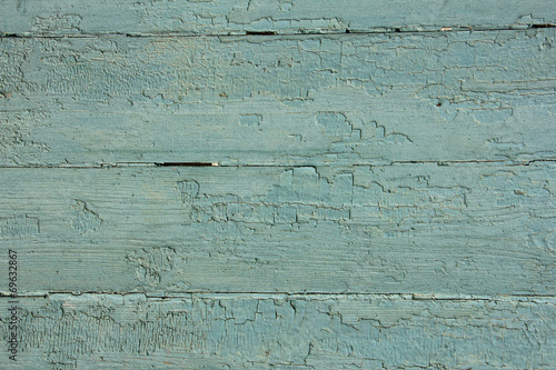 light blue wooden planks with peeling paint, texture