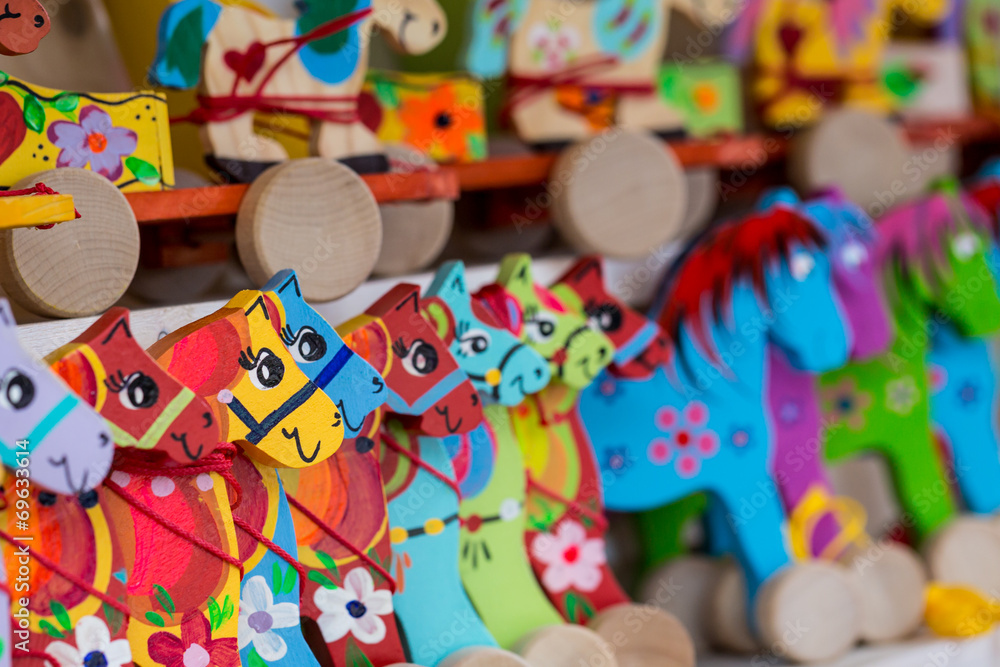 Wooden horses on a market stall