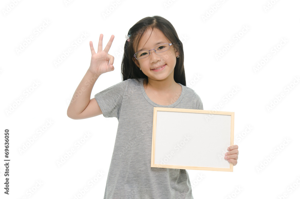 Little Asian girl holding empty whiteboard Little Asian girl holding empty whiteboard