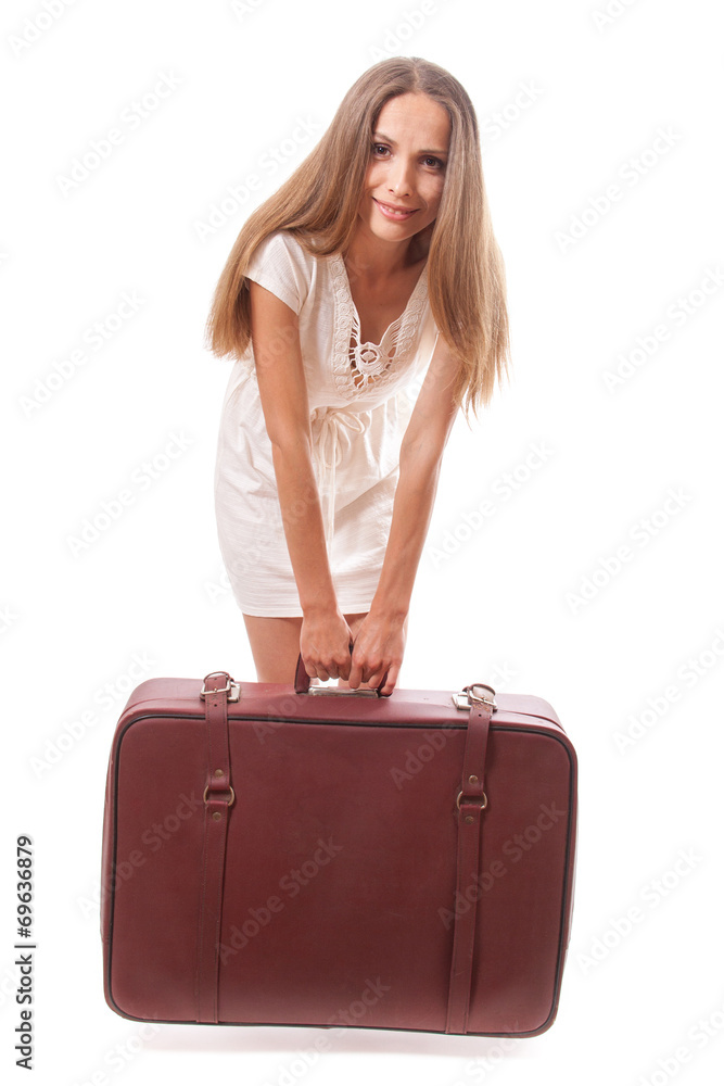 Girl standing with suitcase. Isolated on white Girl standing with suitcase. Isolated on white