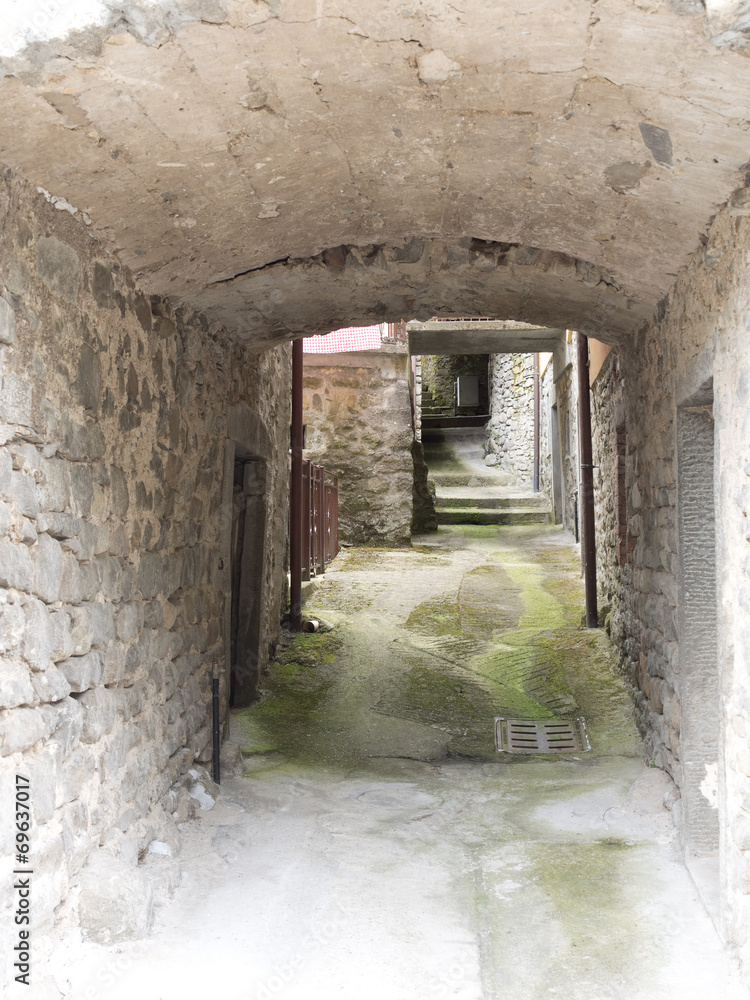 Light and airy alleyway, narrow street, in ancient village. Ital Light and airy alleyway, narrow street, in ancient village. Ital