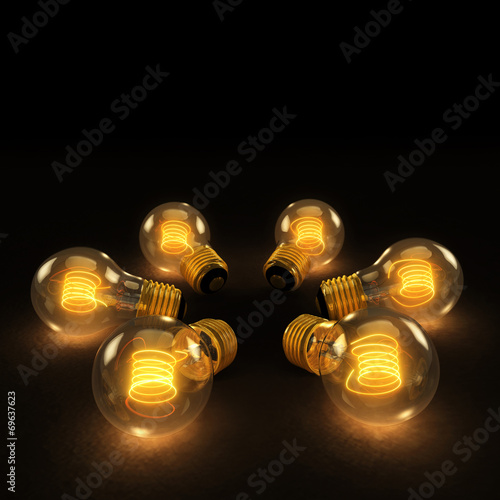 Six Incandescent Lightbulbs in a circle on dark background