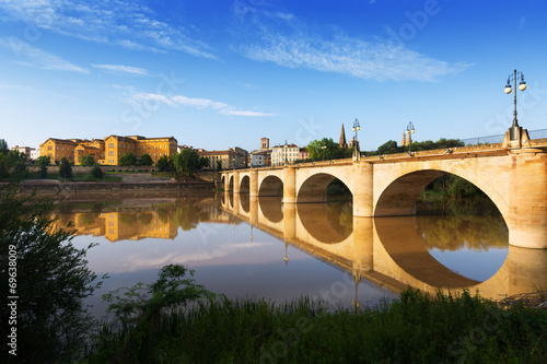 Day view of ancient bridge over Ebro river. Logrono