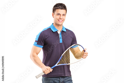 Young male racquetball player photo