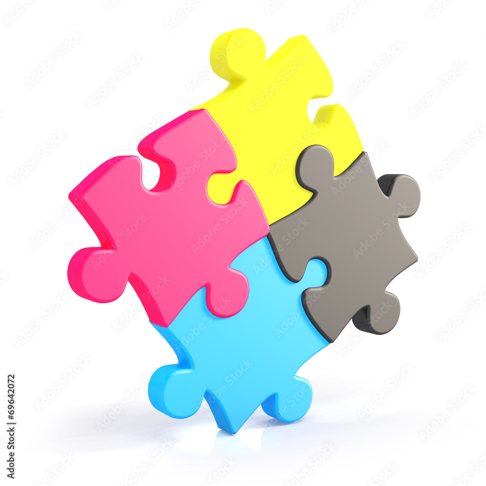 Four assembling colorful puzzle pieces in cmyk Four assembling colorful puzzle pieces in cmyk
