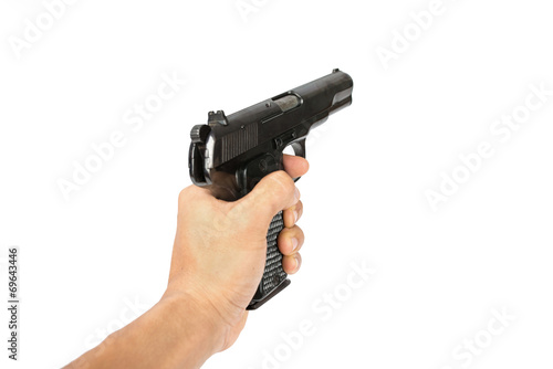 Men's hand with a Semi-automatic 9mm gun isolated
