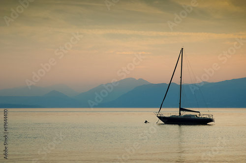 Single boat at Garda lake, Italy