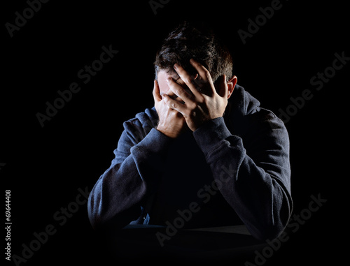 Obraz na plátne desperate man suffering emotional pain, grief, depression
