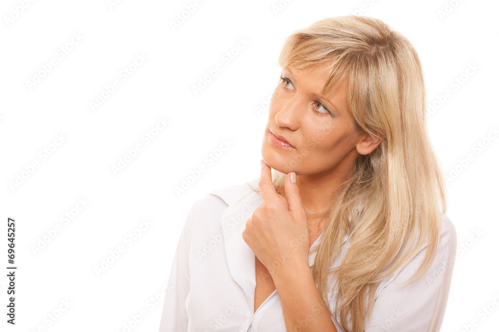 Thinking mature woman looking up isolated Thinking mature woman looking up isolated