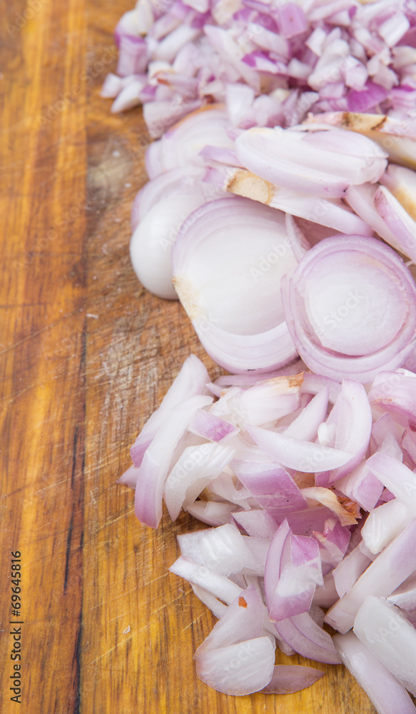 Chopped onions on a chopping board Chopped onions on a chopping board