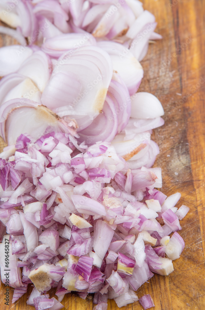 Chopped onions on a chopping board Chopped onions on a chopping board