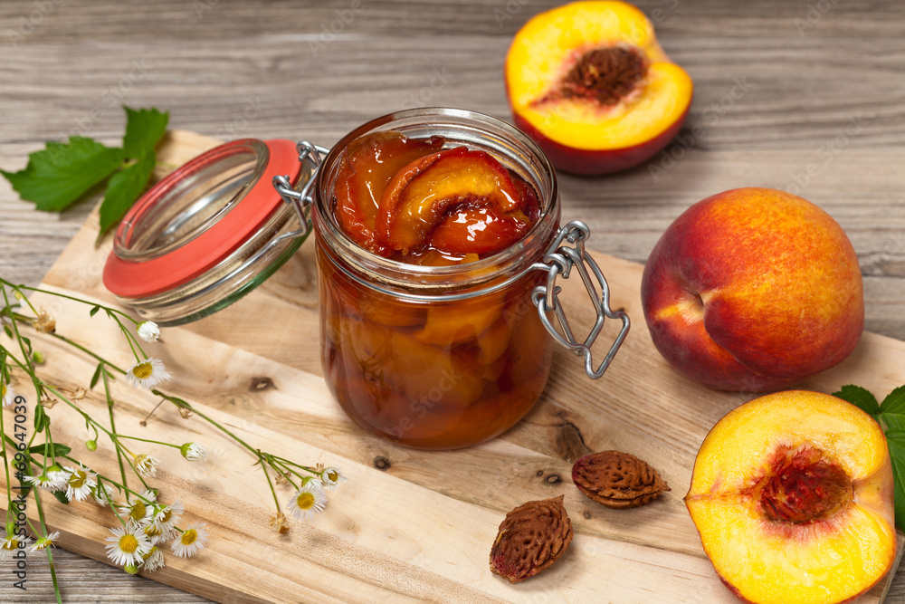 Peach or Nectarine Jam with chalkboard. Selective focus. Peach or Nectarine Jam with chalkboard. Selective focus.