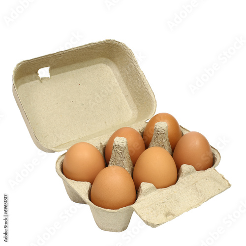 Six brown eggs in a carton package isolated with clipping path