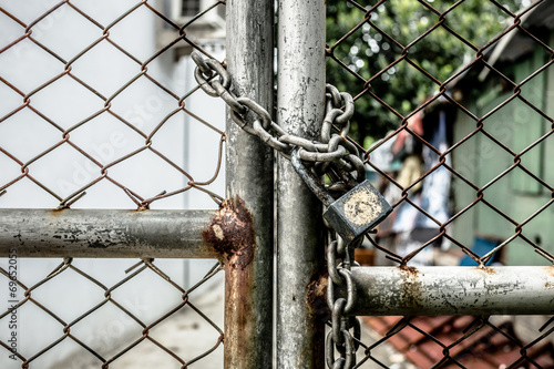 Lock on a chain link security fence