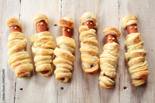 Six Weiners Wrapped in Pastry to Look Like Mummies photo