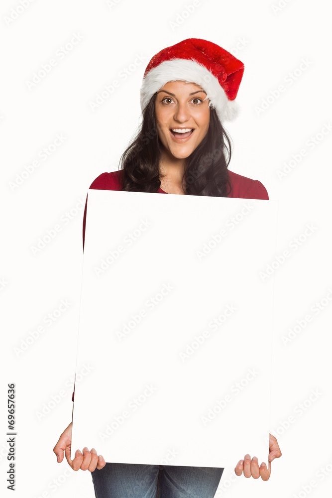 Woman holding a white sign