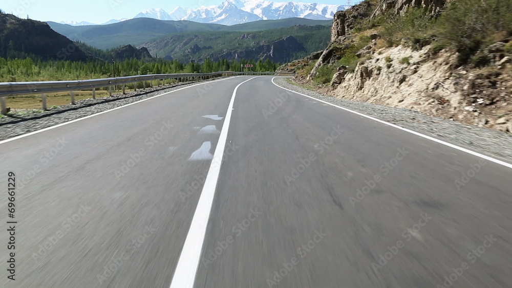 Driving on a Mountain Road, Altai Republic, Russia Driving on a Mountain Road, Altai Republic, Russia