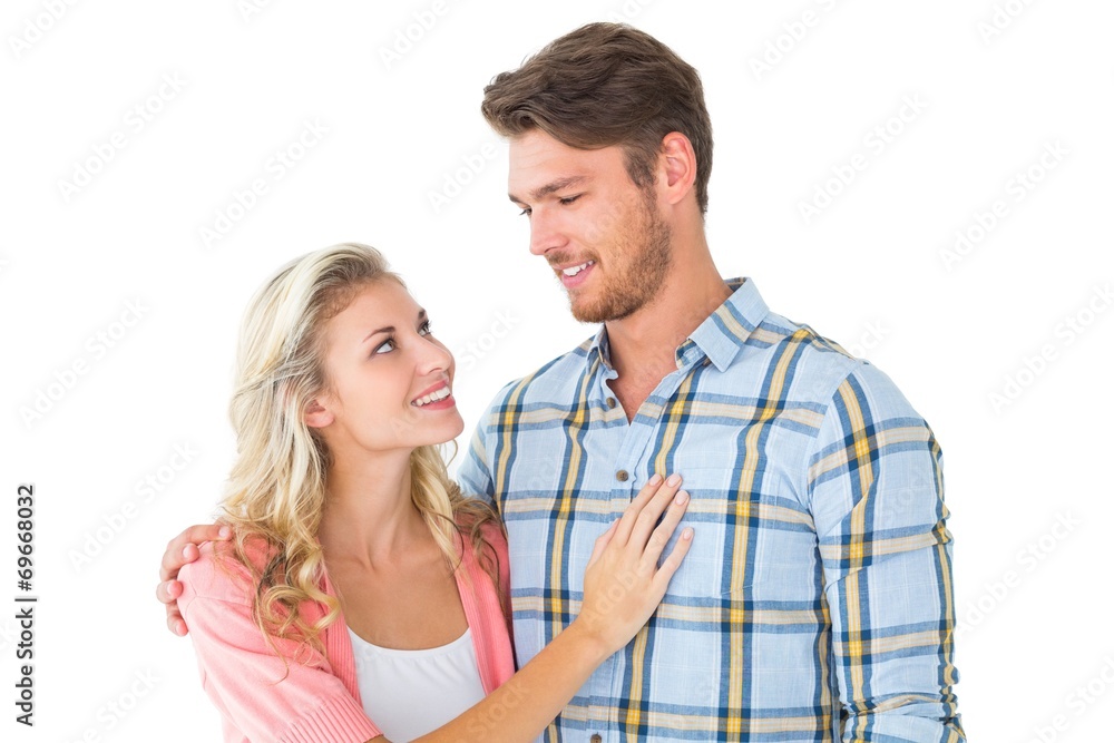Attractive young couple smiling at each other Attractive young couple smiling at each other