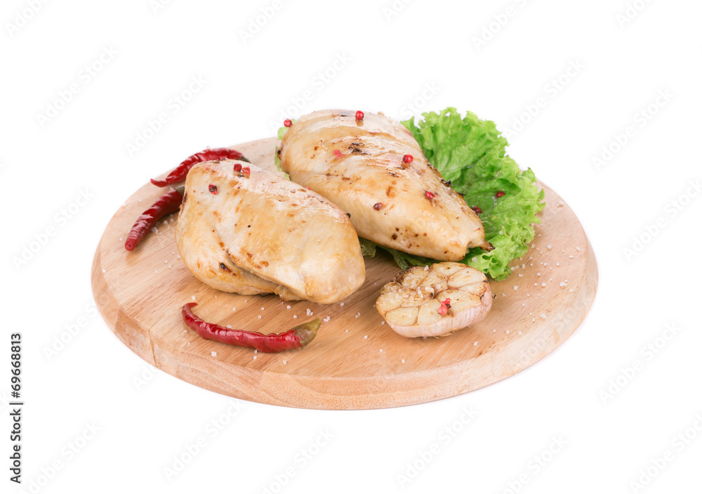 Close up of grilled chicken fillet. Close up of grilled chicken fillet.