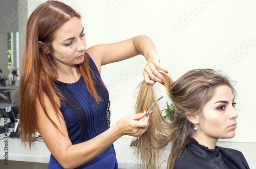 woman in a beauty salon doing hair
