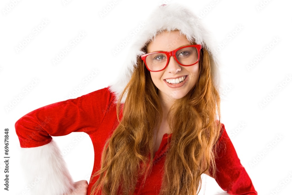 Festive redhead smiling at camera Festive redhead smiling at camera