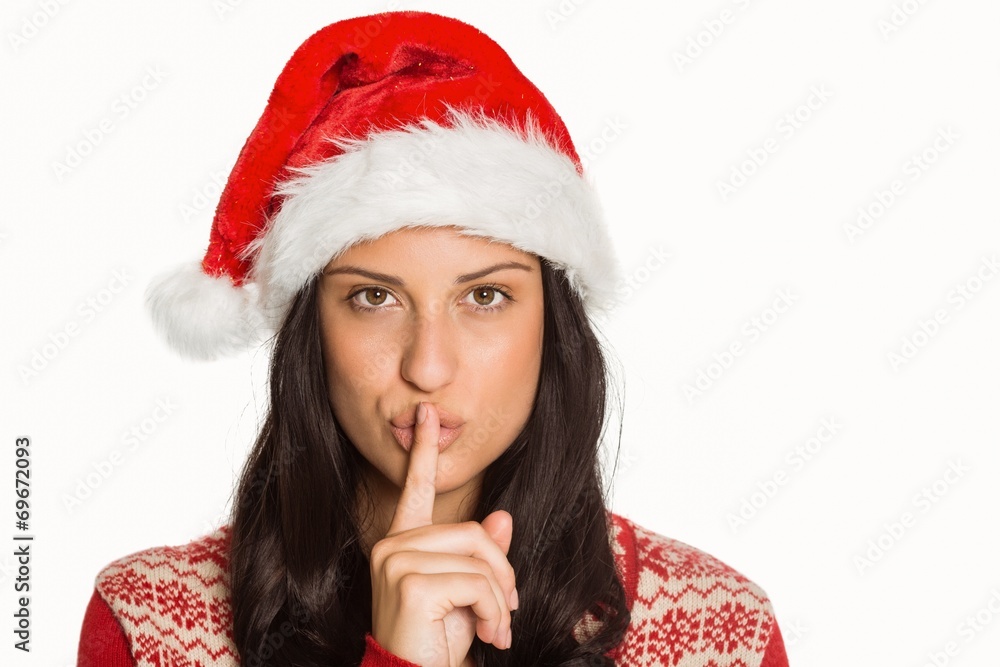 Woman holding finger to lips Woman holding finger to lips