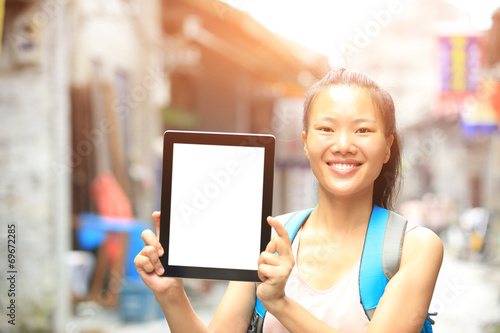 woman tourist use digital tablet outdoor