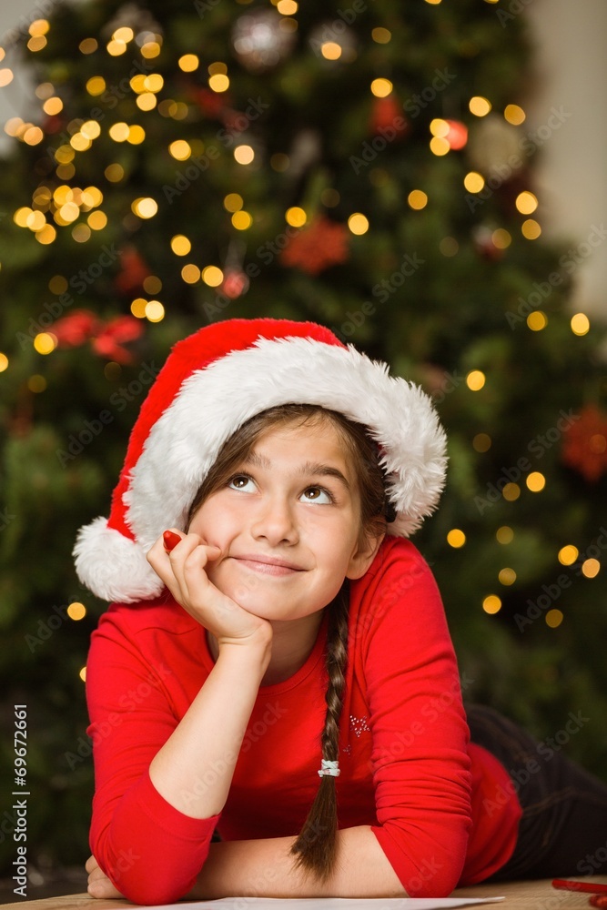 Little girl writing letter to santa at christmas Little girl writing letter to santa at christmas