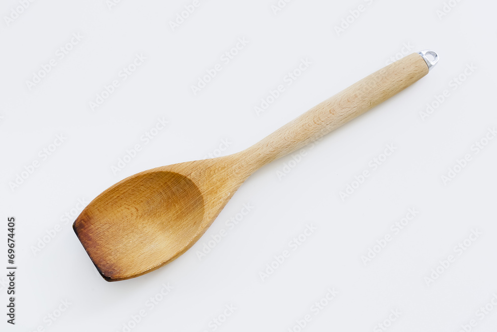 Wooden spatula isolated on white background Wooden spatula isolated on white background