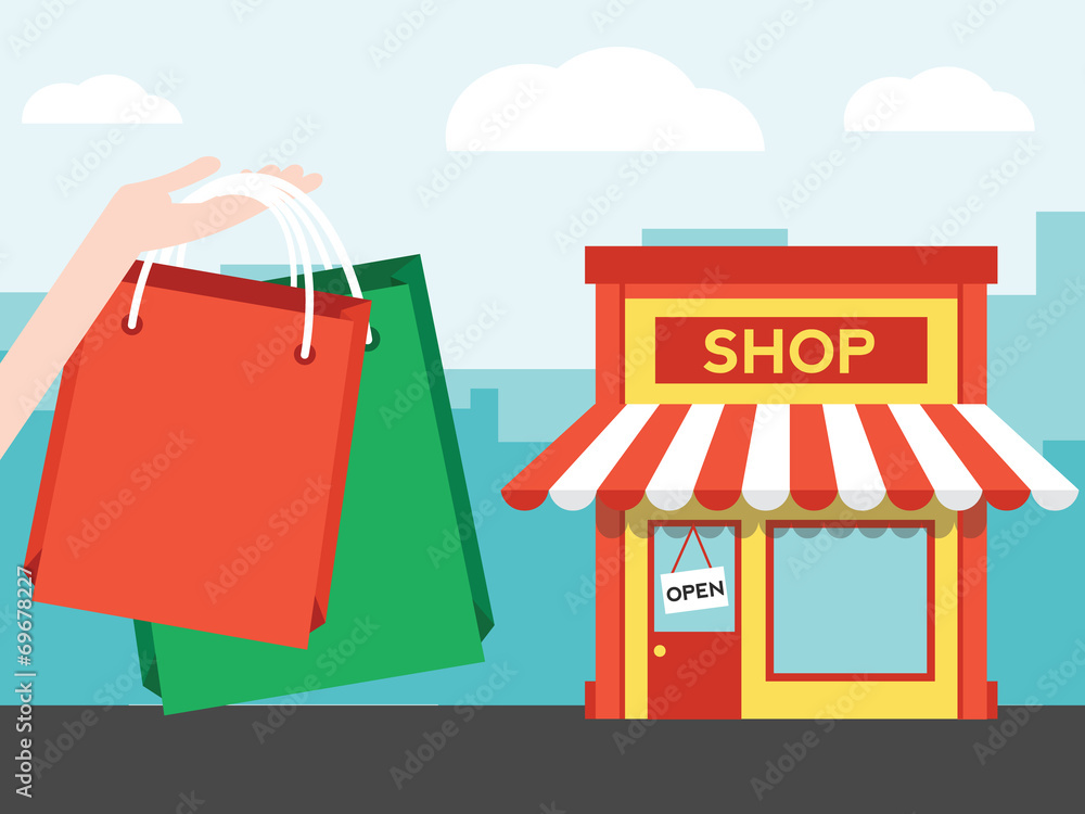 Shopping in the city with bag and front of shop Shopping in the city with bag and front of shop